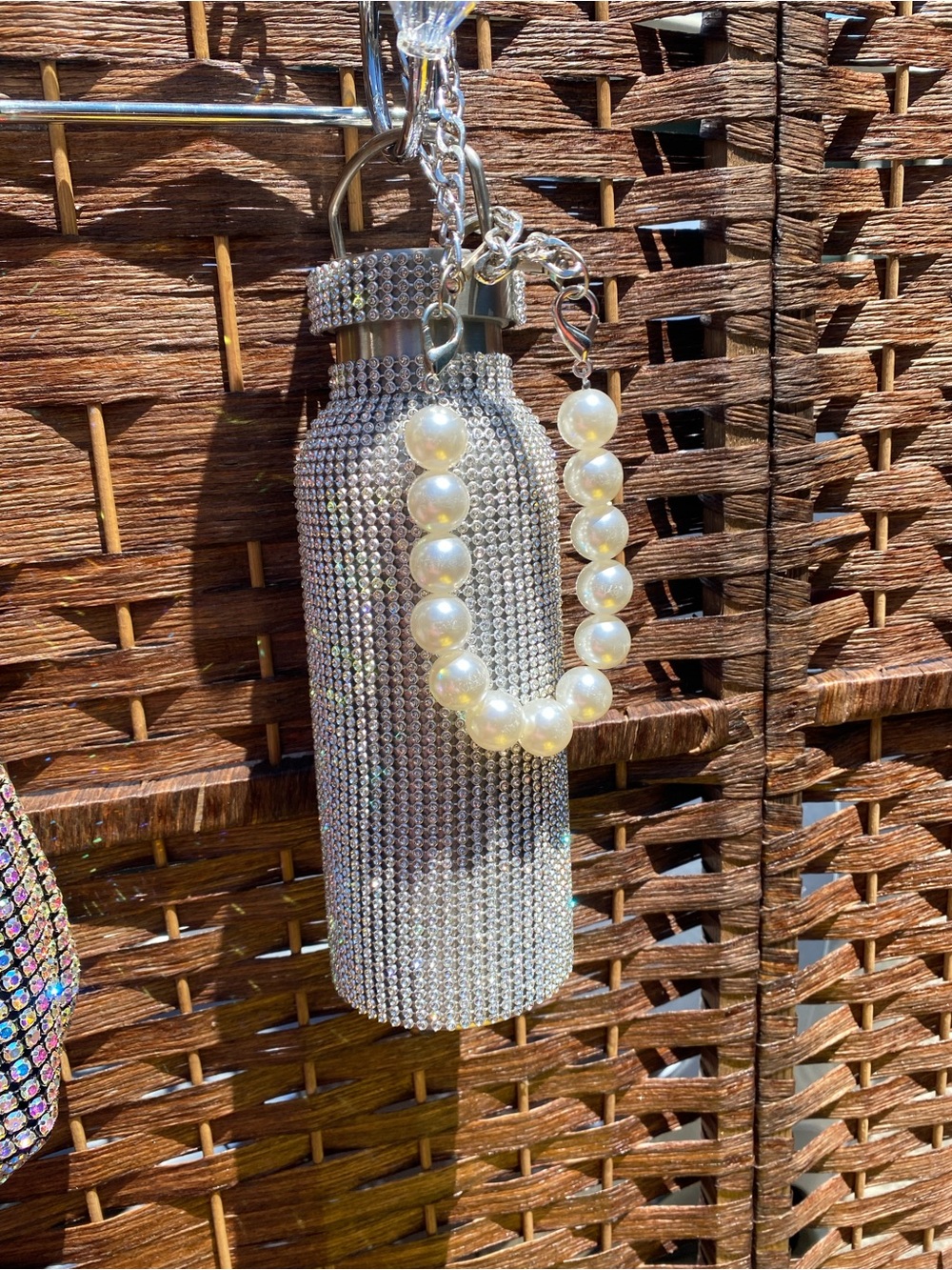 Stainless Steel Studded water bottle with long chain and Pearl handle.